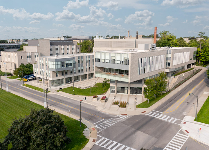 Aerial shot of an intersection at Western University highlighting parking and transportation